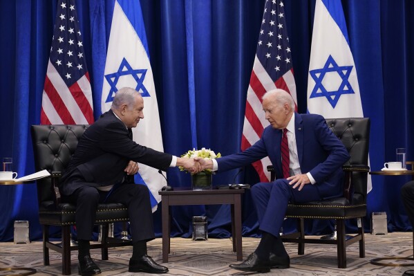 FILE - President Joe Biden meets with Israeli Prime Minister Benjamin Netanyahu in New York, Sept. 20, 2023. Less than three weeks ago, Netanyahu sat beside Biden and marveled that an "historic peace between Israel and Saudi Arabia" seemed within reach. Now, the outbreak of war between Israel and the Palestinians is threatening to delay or derail a country-by-country diplomatic push by the United States to improve relations between Israel and its Arab neighbors. (AP Photo/Susan Walsh, File)